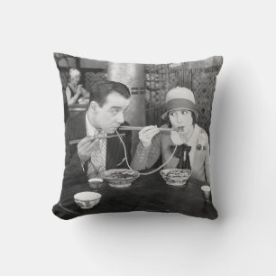 Couple sharing a noodle in a restaurantvintage, fo cushion