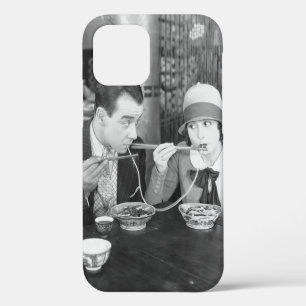 Couple sharing a noodle in a restaurantvintage, fo iPhone 12 case