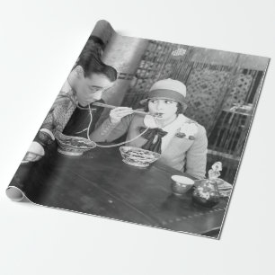 Couple sharing a noodle in a restaurantvintage, fo wrapping paper