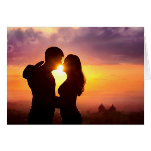 Couple Silhouette At Sunset