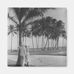 Couple standing at palm tree Rear view B&W Magnet