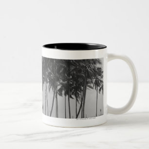 Couple standing at palm tree Rear view B&W Two-Tone Coffee Mug