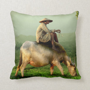 Cow Grazing with Farmer in a Scenic Pasture Cushion