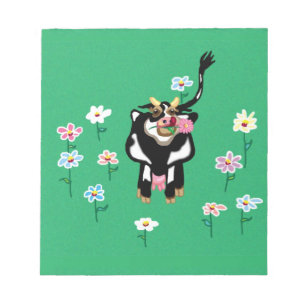 Cow in green pastures with flowers notepad