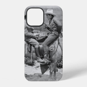 Cowboy and businessman playing checkers on horseba iPhone 12 case