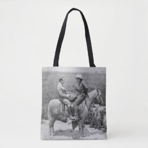 Cowboy and businessman playing checkers on horseba tote bag