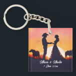 Cowboy and Cowgirl Wedding in Silhouette Key Ring<br><div class="desc">A cowboy and his bride are silhouetted against a beautiful setting sun.</div>