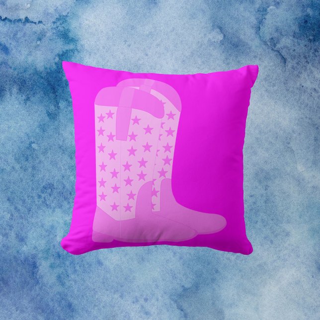 Cowboy Boots with Stars Pink Cushion (A throw pillow with a pair of pink cowboy boots with stars on a pink background.)