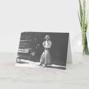 Cowboy eating from a Peter Pan peanutbutter can. Card