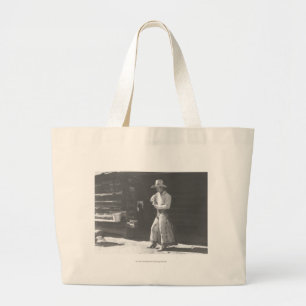 Cowboy eating from a Peter Pan peanutbutter can. Large Tote Bag