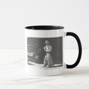Cowboy eating from a Peter Pan peanutbutter can. Mug