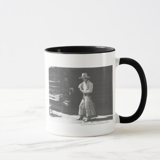 Cowboy eating from a Peter Pan peanutbutter can. Mug (Right)