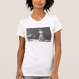 Cowboy eating from a Peter Pan peanutbutter can. T-Shirt