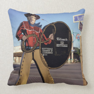 Cowboy figure sign welcoming tourists to Scottsdal Cushion