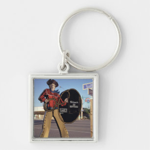 Cowboy figure sign welcoming tourists to Scottsdal Key Ring