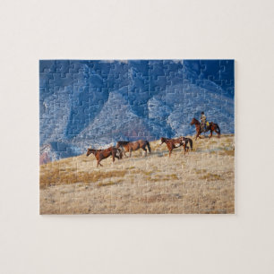 Cowboy herding wild horses jigsaw puzzle