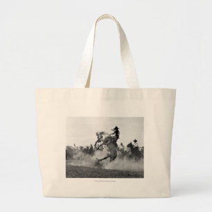 Cowboy on a bucking bronco large tote bag