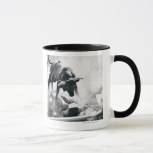 Cowboy on ground after falling off bull mug