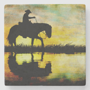 Cowboy on Horseback at Sunset. Stone Coaster