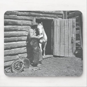 Cowboy reading a letter mouse pad