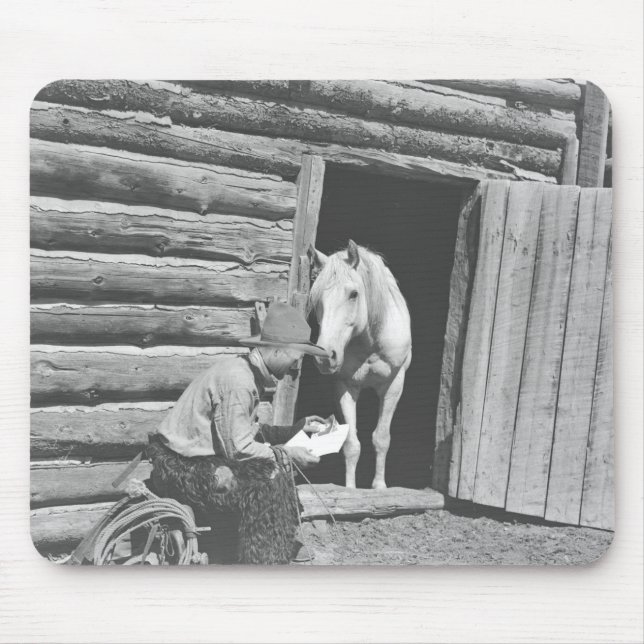 Cowboy reading a letter with a horse mouse pad (Front)