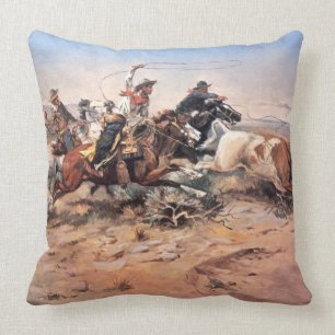 Cowboys roping a steer, 1897 (oil on canvas) cushion