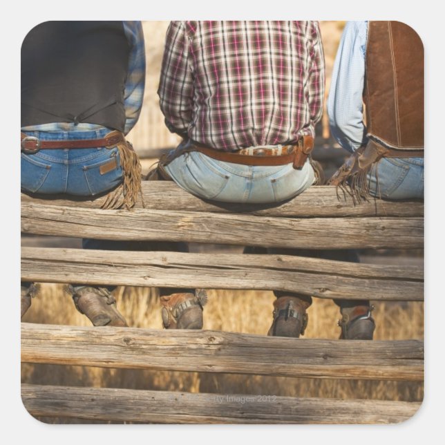 Cowboys sitting on fence square sticker (Front)