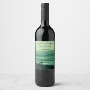 Coyote silhouette against green foothills wine label