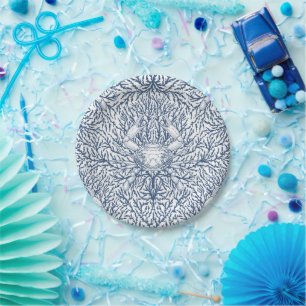 Crab and sea weed in white and navy paper plate