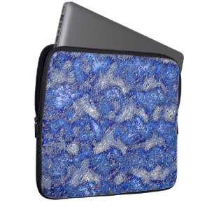 Cracked to very rough grey stains on blue texture laptop sleeve