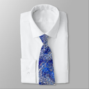 Cracked to very rough grey stains on blue texture  tie