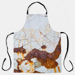 Cracked white paint, rusty car. apron