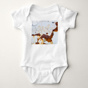 Cracked white paint, rusty car. baby bodysuit