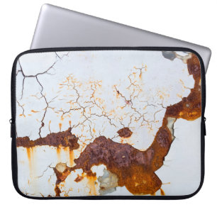 Cracked white paint, rusty car. laptop sleeve