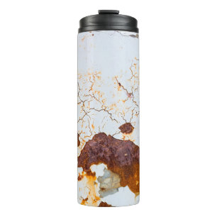 Cracked white paint, rusty car. thermal tumbler