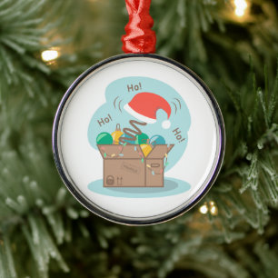Craft box with Christmas decoration and Santa hat