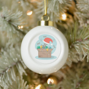 Craft box with Christmas decoration and Santa hat