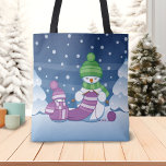 Crafty Snowman Knitting Scarf Tote Bag<br><div class="desc">Vector illustration of two adorable cartoon snowmen dressed in knitted hats and scarves. The big crafty snowman is knitting an oversized scarf for the little one. The scarf is already wrapped several times around the cute little snowman.</div>