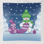 Crafty Snowman Knitting Scarf Trinket Trays<br><div class="desc">Vector illustration of two adorable cartoon snowmen dressed in knitted hats and scarves. The big crafty snowman is knitting an oversized scarf for the little one. The scarf is already wrapped several times around the cute little snowman.</div>