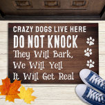 Crazy Dogs Live Here Do Not Knock Funny Pets Dog Doormat<br><div class="desc">Introducing the perfect door mat for all dog lovers out there! This modern and stylish mat is the ideal way to welcome guests into your home with a touch of humour and cuteness. The faux coir material is both durable and environmentally friendly, while the paw prints and the playful phrase...</div>