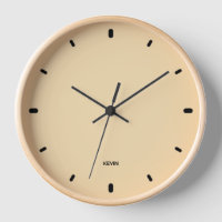 Cream colour clock face with black hours numbers