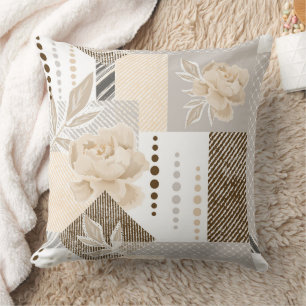 Cream flowers on white cushion
