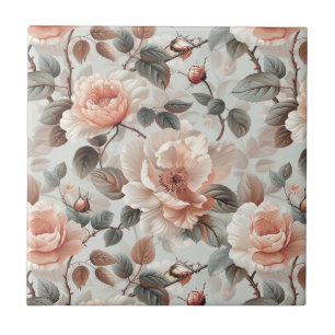 Cream flowers with grey leaves on a light grey ceramic tile
