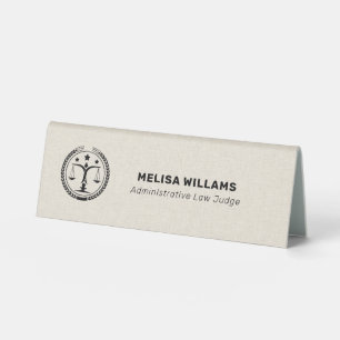 Cream Linen and Black Justice Logo