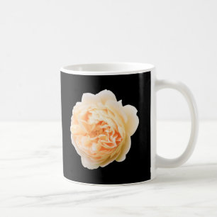 Cream rose closeup isolated on black background coffee mug