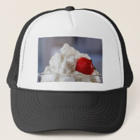 Cream with strawberries in a glass bowl