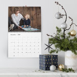Creating Memories 2025 Photos Calendar<br><div class="desc">Share a favourite memory on each page of this 2025 photo calendar. The cover features a thumbnail version of each photo with a "creating memories" in the centre on a blue watercolor background. Personalise with your family name and year.  Inside,  your photos appear in vibrant full bleed.</div>