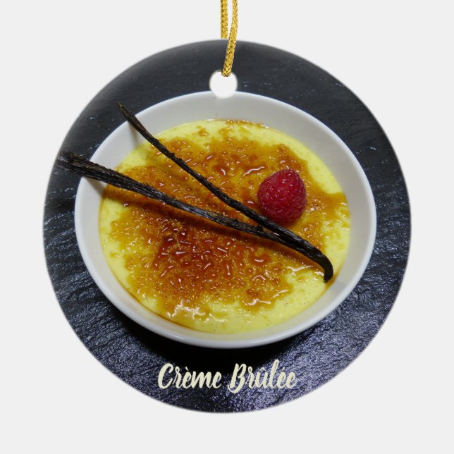 Creme brulee on slate with raspberry and vanilla ceramic ornament (Front)