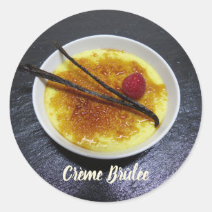 Creme brulee on slate with raspberry and vanilla classic round sticker