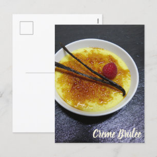 Creme brulee on slate with raspberry and vanilla holiday postcard